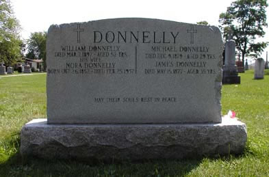 [ Back View of Donnelly Tombstone at St. Patrick\'s Roman Catholic Cemetery, Biddulph, 2005, Copyright Great Unsolved Canadian Mysteries Project, Jennifer Pettit,   ]