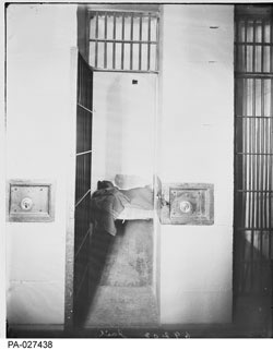 [ Cell in the Ottawa Jail, 1895, This jail cell is typical of those of this time period. , William Topley, National Archives of Canada PA-027438 ]