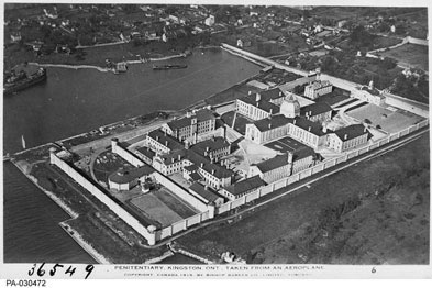 [ Aerial View of the Kingston Penitentiary, 1919, Bishop Barker Co., National Archives of Canada PA-030472 ]