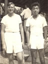 Norman and unidentified Japanese tennis partner