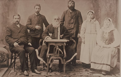 [ Peter V. Verigin, Anastasia Holobova and others in Russia in 1906.  Standing on Verigin's left is a translator from Canada who accompanied the group, Dmitri Gretchen, apparently not related to the mysterious Metro Grishin, Unknown, Koozma Tarasoff personal collection 544 ]