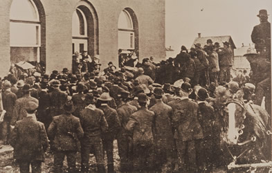 [ A crowd of land seekers besiege the Yorkton land titles office seeking lands expropriated from the Doukhobor commune by the federal government, , Koozma Tarasoff personal collection 1130 ]