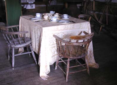 [ Front Room Table, Lucan Area Heritage and Donnelly Museum, Copyright Great Unsolved Canadian Mysteries Project, Jennifer Pettit,   ]