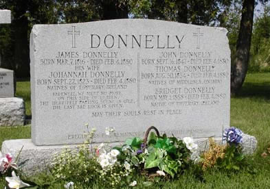 [ Donnelly Family Tombstone at St. Patrick's Roman Catholic Cemetery, Biddulph, 2005, Copyright Great Unsolved Canadian Mysteries Project, Jennifer Pettit,   ]