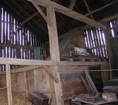 [ Interior of the Barn Located On the Donnelly Property Today, This barn was built in the 1880s, after the murders took place.  Some claim to have sighted ghost-like figures in the barn. Thanks to Robert Salts, present-day owner of the Donnelly Homestead, who allowed this photograph to be taken. Copyright Great Unsolved Canadian Mysteries Project, Jennifer Pettit,   ]