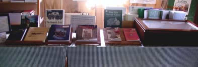 [ Display Table at the Lucan Area Heritage and Donnelly Museum, This display table at the Donnelly Museum showcases just some of the many books and other materials written about the Donnellys.    Copyright Great Unsolved Canadian Mysteries Project, Jennifer Pettit,   ]