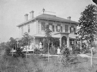[ Home of Bernard Stanley About 1875, The size of the house is indicitive of Stanley's wealth.  Compare this home to that of a rural family like the Donnellys., Unknown, University of Western Ontario Archives RC100309 ]