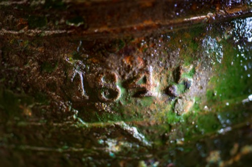 Detail of embossed “1845” on the bell of HMS Erebus