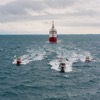 Survey vessels steaming in formation at the conclusion of the successful field project