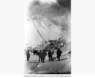 [ The Chilkoot Pass.  The people on the right are sliding back down for another load. ]