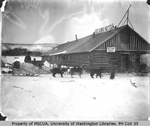 Dogsled in front of the Selkirk Hotel, Yukon