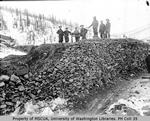 Miners working on mining dump, Hunker Creek
