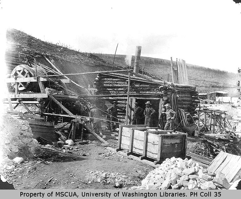 [ Miners in front of Magaw and Andrew\\\'s boiler house (steam to melt permafrost) ]