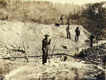 Gold miners operating sluice on claim No. 39 below Hunker Creek