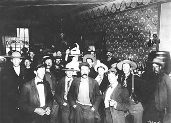 [ Men and women at the bar of the Monte Carlo, Dawson ]