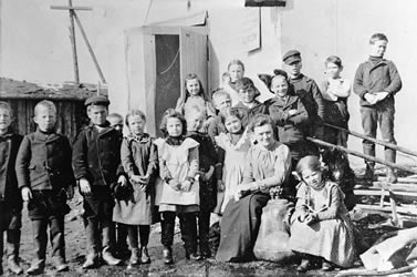 [ Miss Lind and students of Dawson\'s first school ]