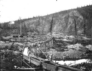 [ Gold mining operation on Bonanza Creek ]