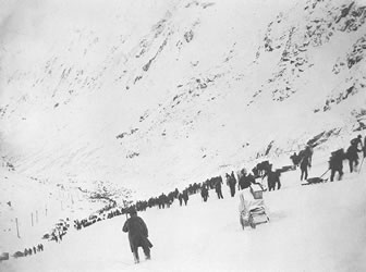 [ Miners Halfway up the Chilkoot Pass ]