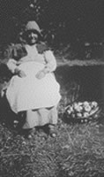[ Mrs. Sylvia Stark (aged 92) with apples from her orchard, Saltspring Island ]