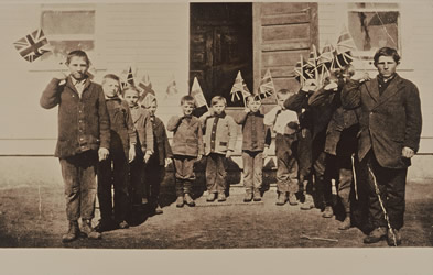 [ Children parade their patriotism at Henrietta Public School, North Saskatchewan River, 1917, , Koozma Tarasoff personal collection 1215 ]