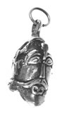Replica of Viking Age silver amulet in form of the head of a man, found at Aska, Sweden.